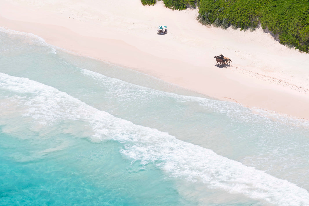 Photography by Gray Malin of Afternoon Ride, The Dunmore Hotel, Harbour Island, Bahamas