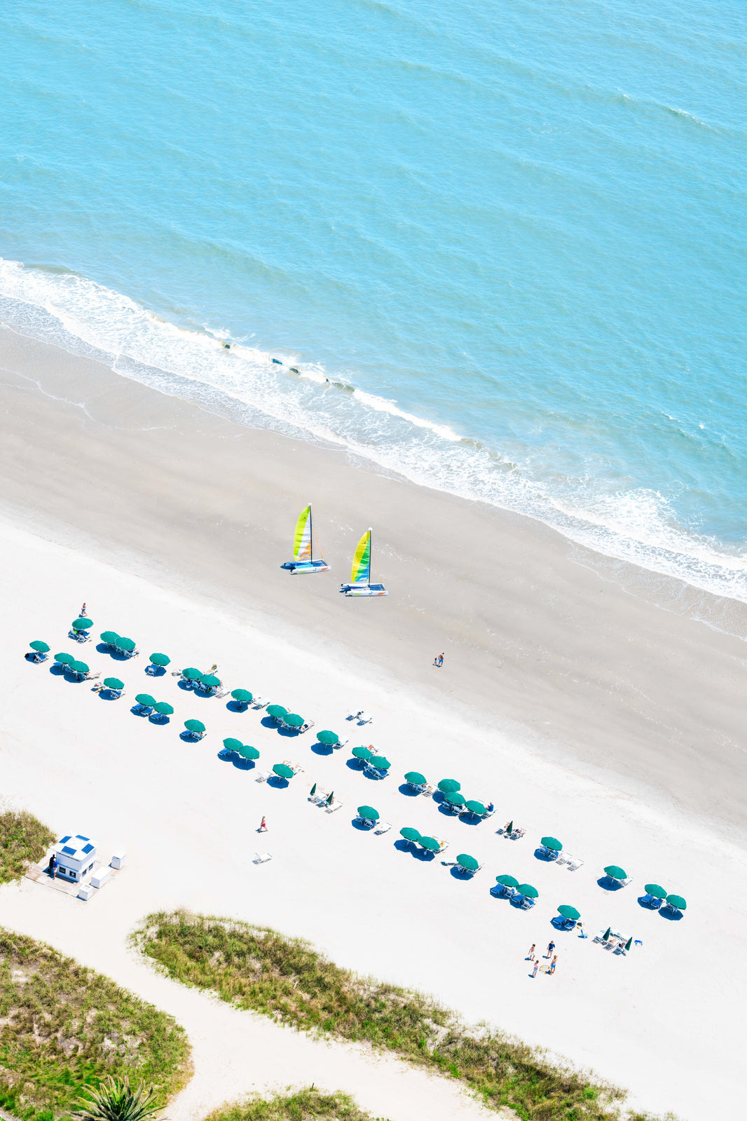 Photography by Gray Malin of Beach Day Vertical, The Cloister at Sea Island, Georgia