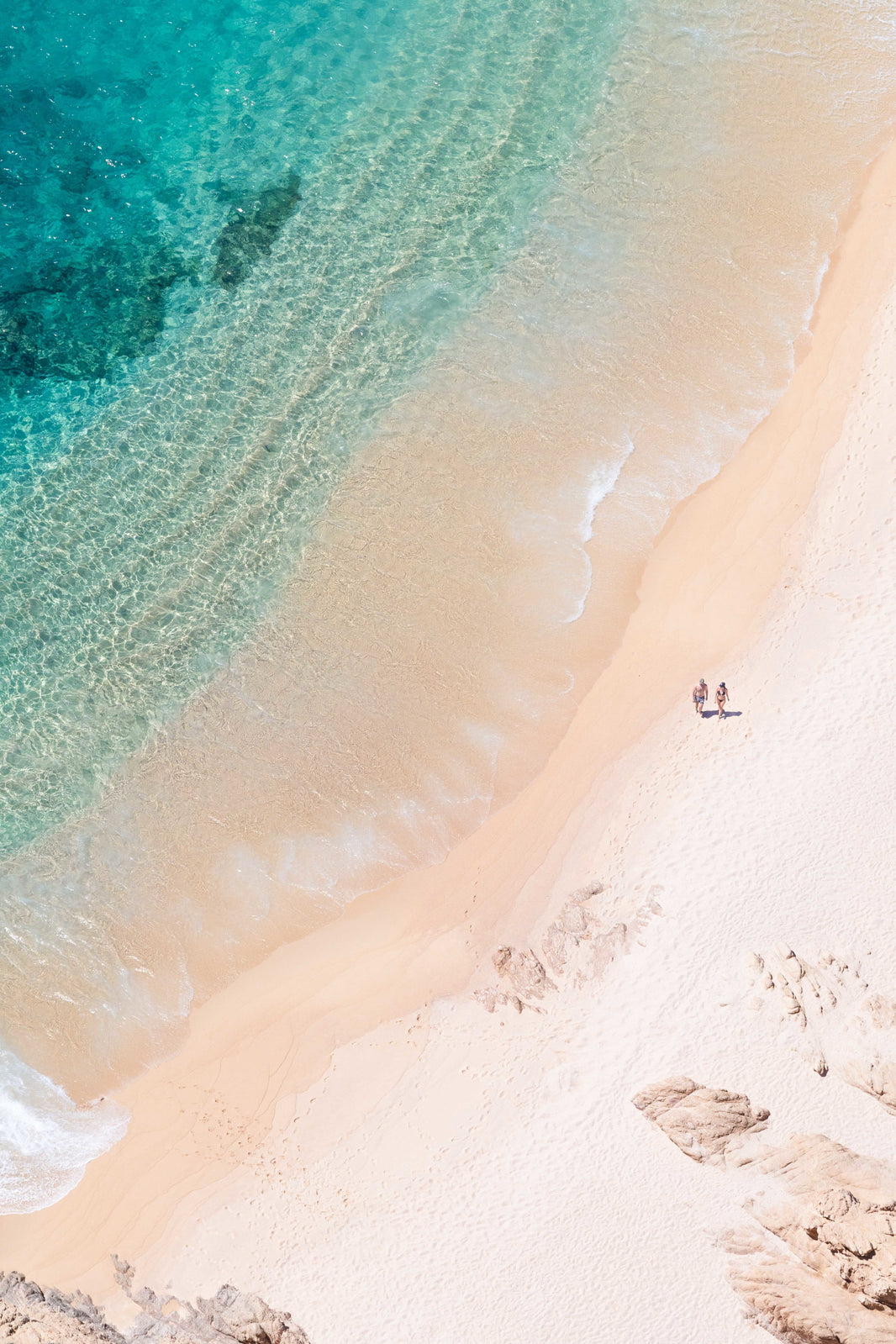 Photography by Gray Malin of Beach Stroll Vertical, Cabo San Lucas