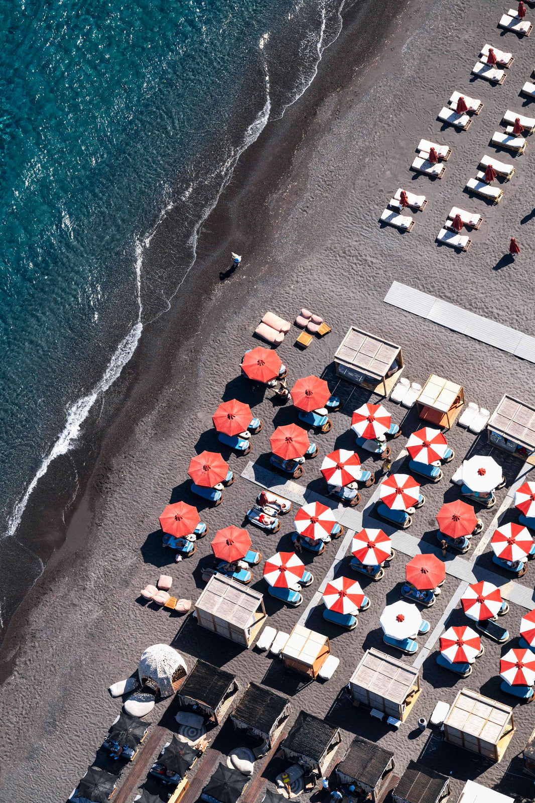 Photography by Gray Malin of Black Sand Beach, Frati Santorini