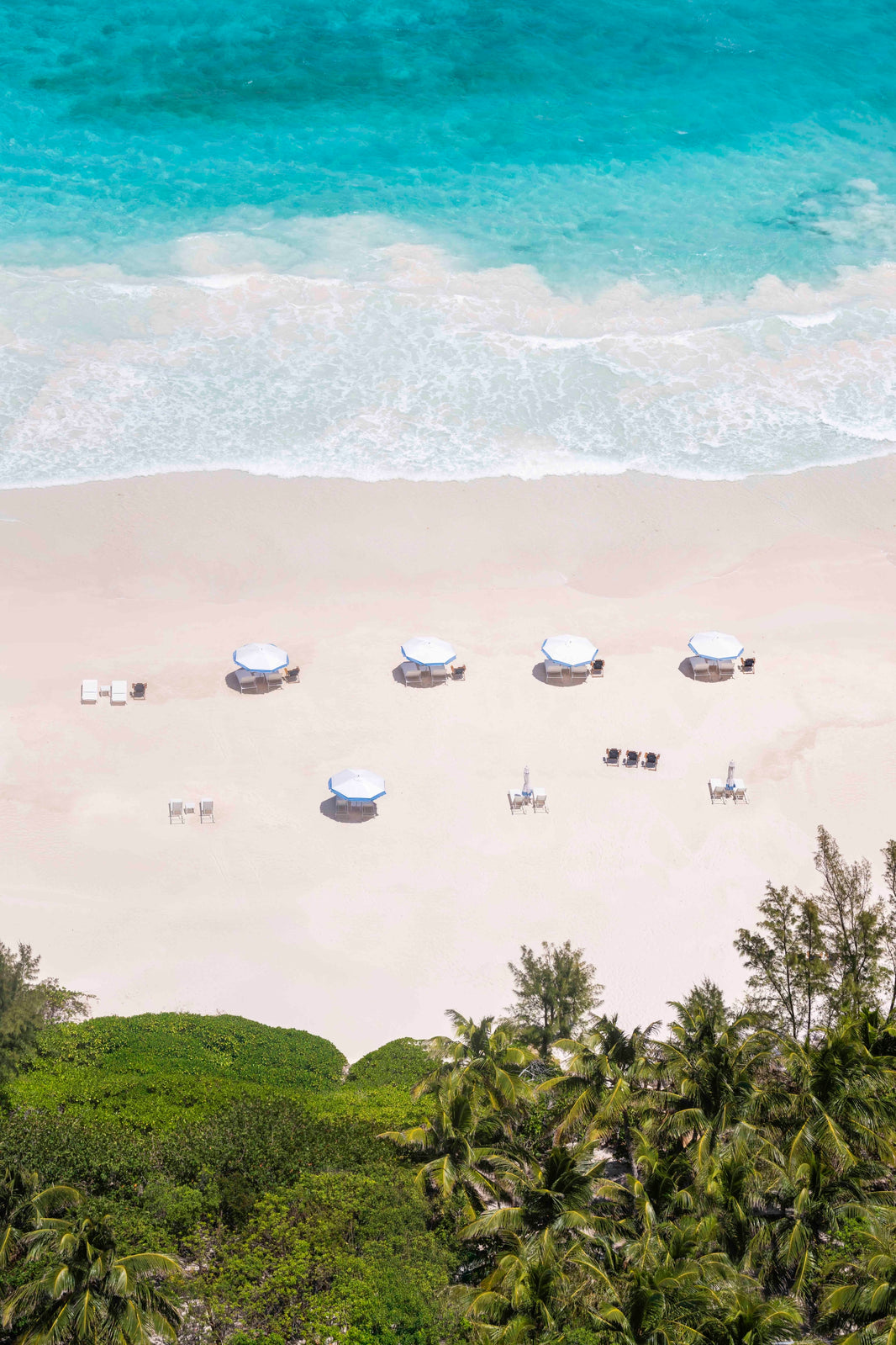 Photography by Gray Malin of Pink Sand Beach Umbrellas Vertical, Briland Club, Harbour Island, Bahamas