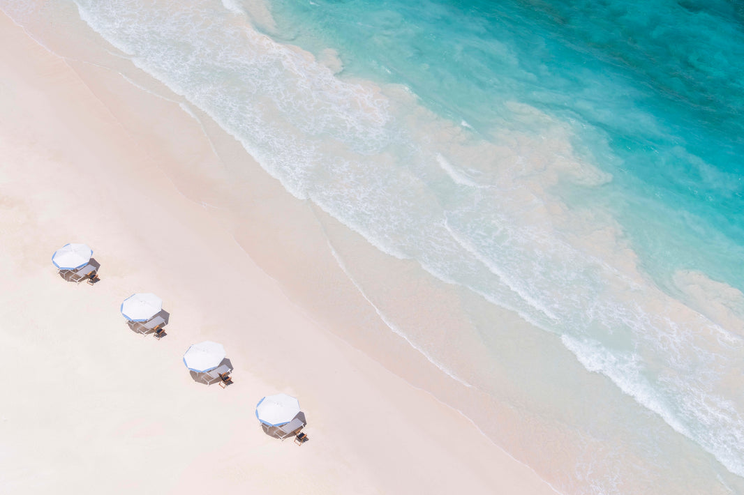 Photography by Gray Malin of Pink Sand Umbrellas, Briland Club, Harbour Island, Bahamas