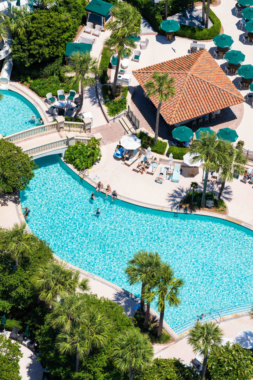 Photography by Gray Malin of Pool Day Vertical, The Cloister at Sea Island, Georgia