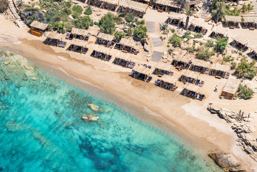 Photography by Gray Malin of Scorpios Beach, Mykonos