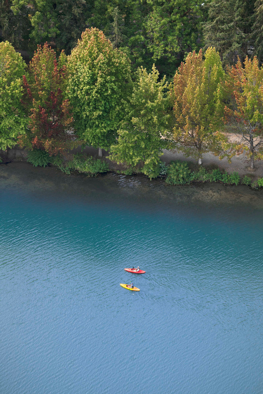 Photography by Gray Malin of The Kayakers, Green Lake, Seattle