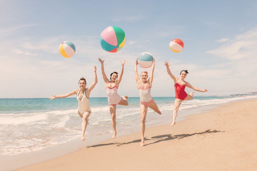 Photography by Gray Malin of Beach Ball Girls