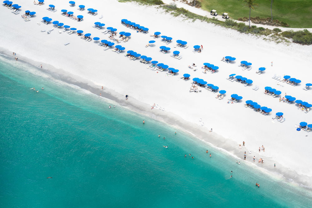 Photography by Gray Malin of Beach Day at Plantation Beach Club, Captiva Island, Florida