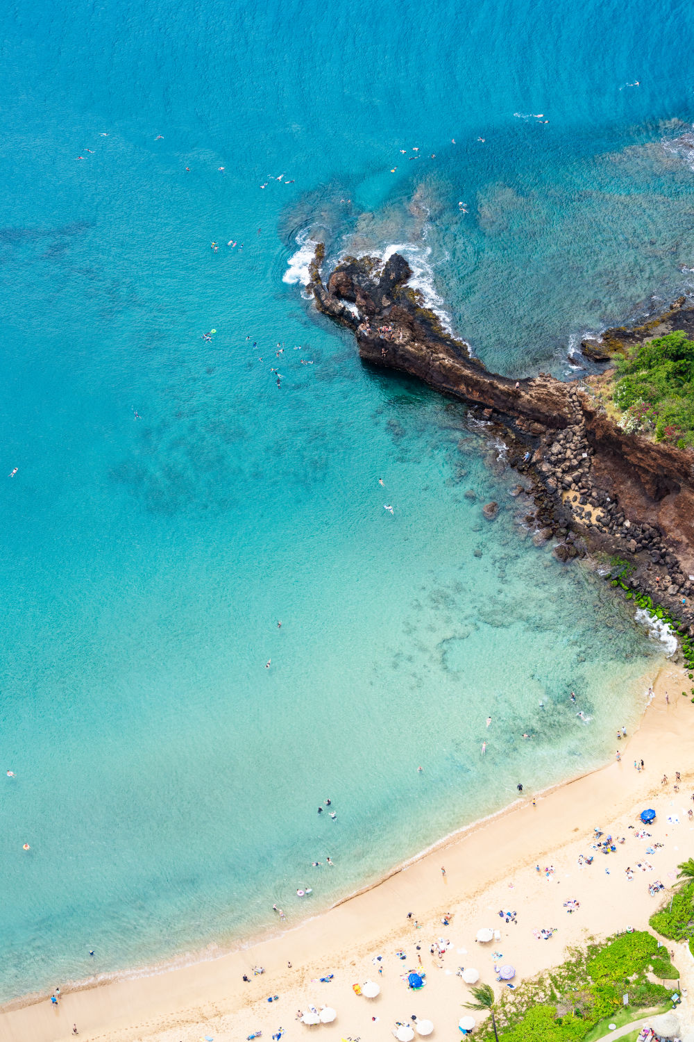 Photography by Gray Malin of Black Rock Beach, Maui