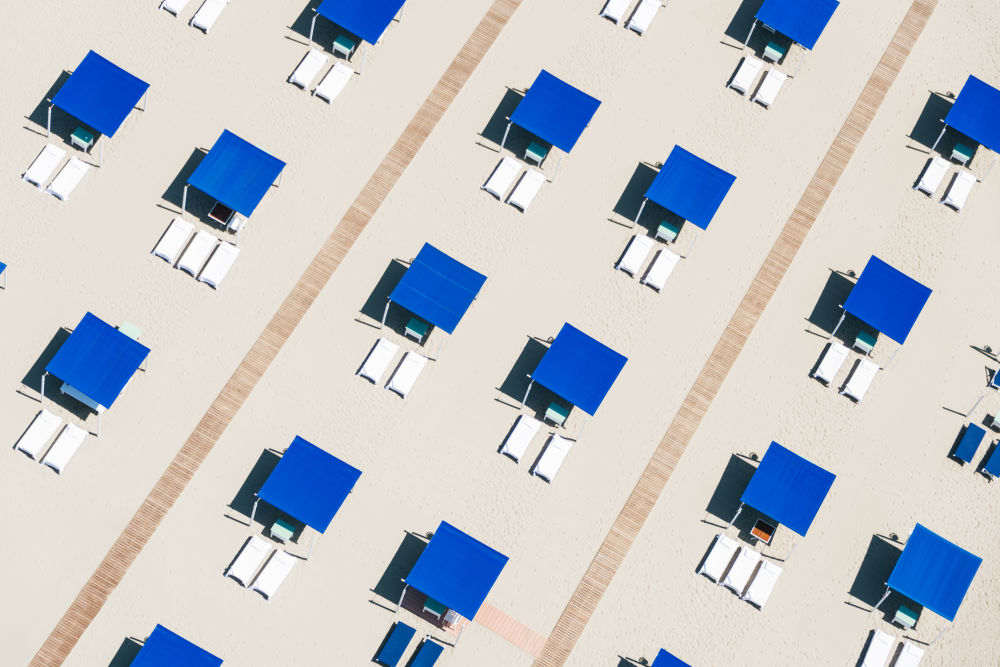 Photography by Gray Malin of Blue Cabanas, Italy