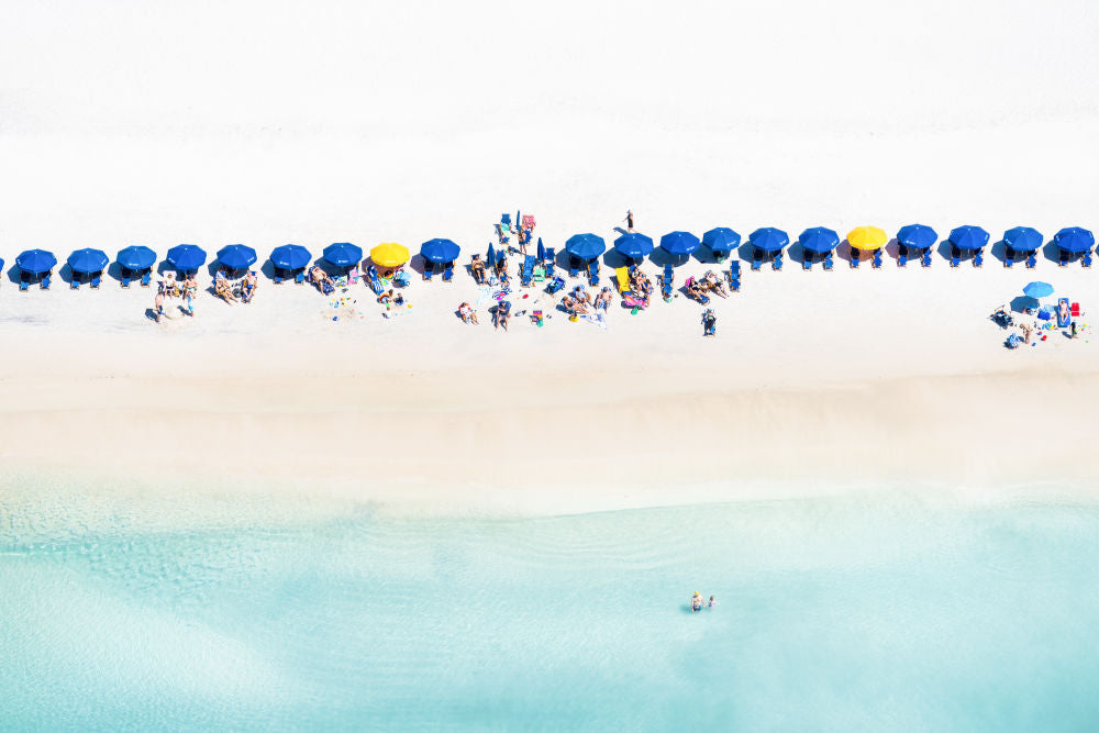 Photography by Gray Malin of Blue and Yellow Umbrellas, Rosemary Beach, 30A Florida