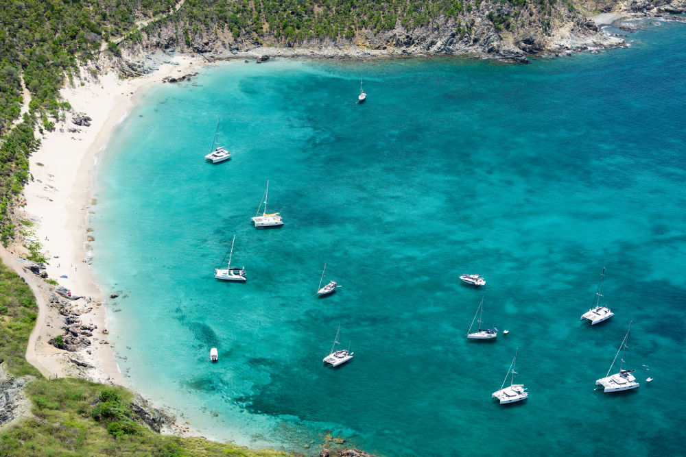 Photography by Gray Malin of Boat Day, Colombier Beach, St. Barths