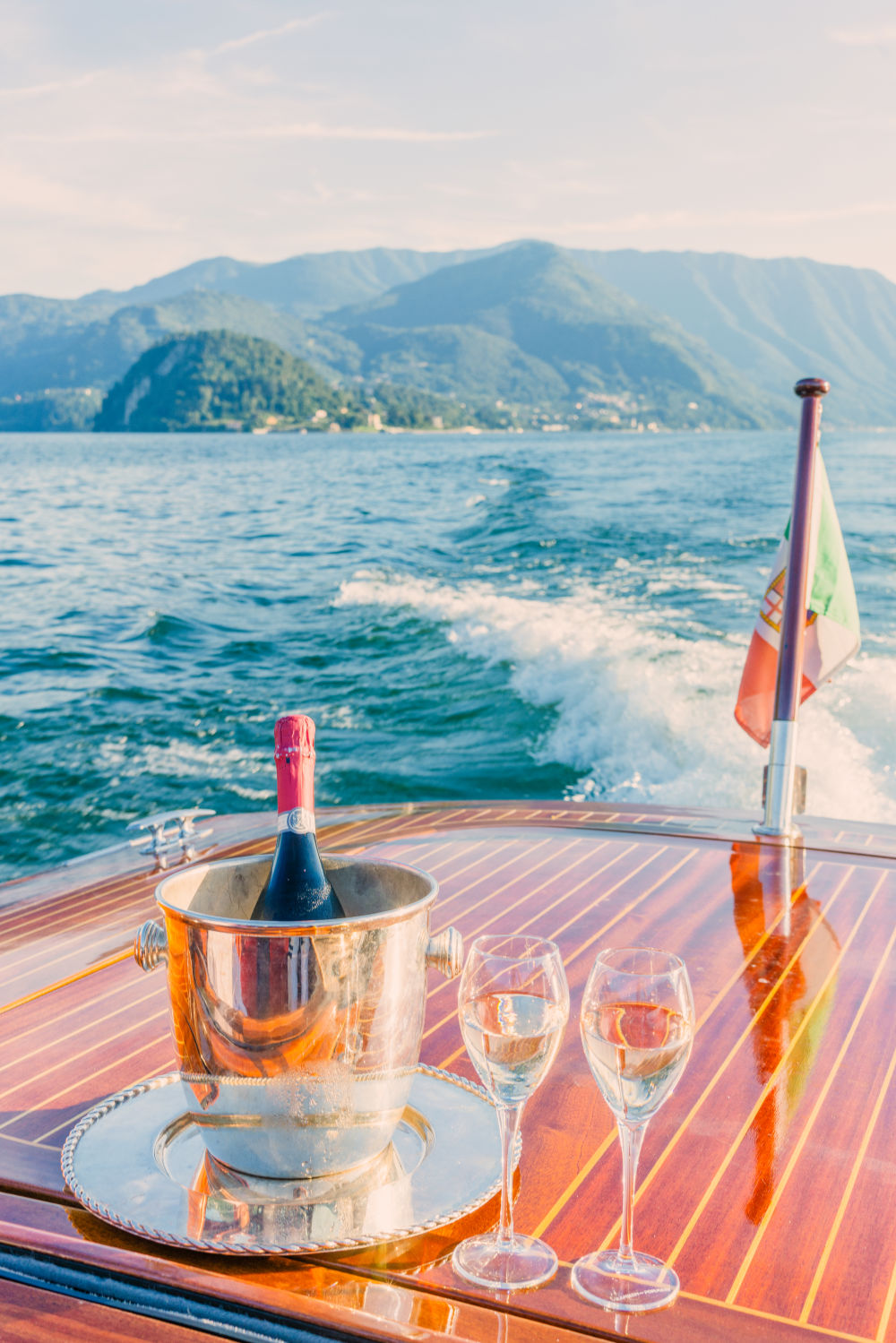 Photography by Gray Malin of Champagne on Lake Como