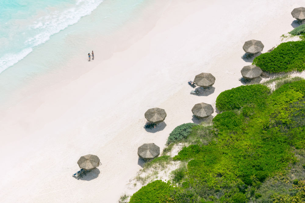 Photography by Gray Malin of Coral Sands Beach Umbrellas, Harbour Island