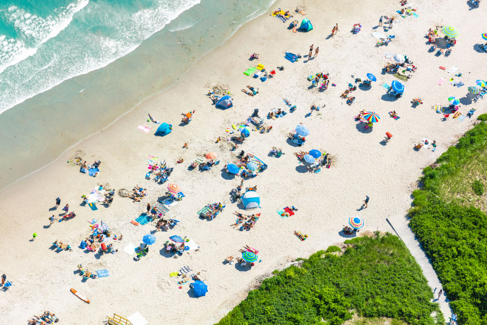 Photography by Gray Malin of Crescent Beach Sunbathers, Maine