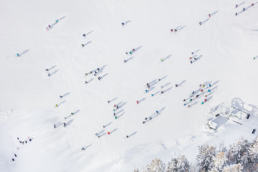 Photography by Gray Malin of Deer Valley Skiers Horizontal