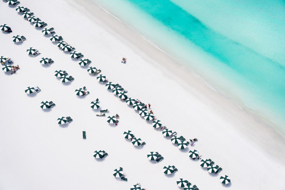 Photography by Gray Malin of Green and White Striped Umbrellas, Marco Island, Florida