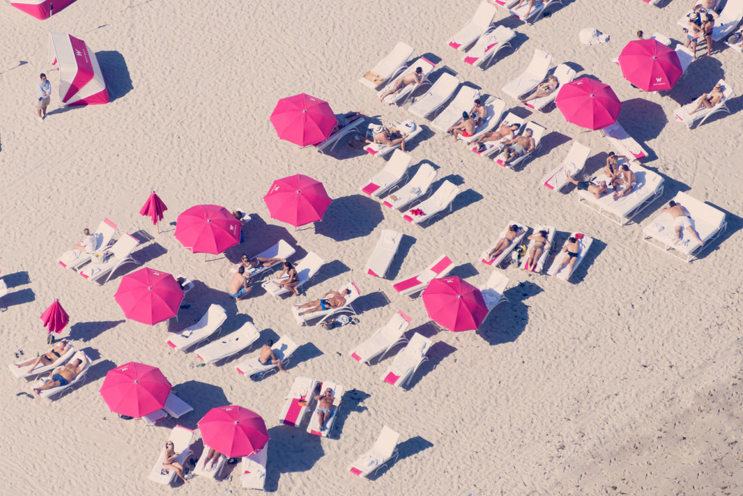 Photography by Gray Malin of Hot Pink Loungers