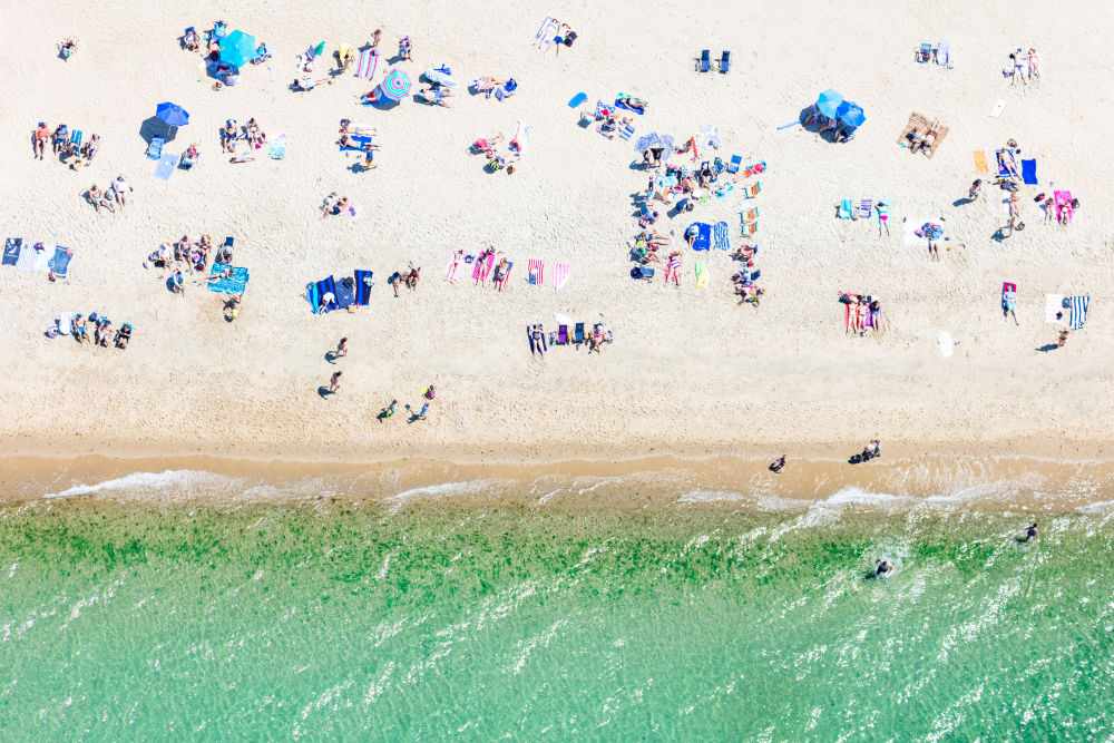 Photography by Gray Malin of Jetties Beach Sunbathers, Nantucket