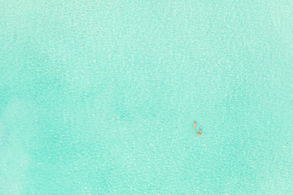 Photography by Gray Malin of Karon Beach Swimmers, Thailand