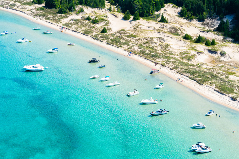 Photography by Gray Malin of Lake Michigan Boats and Sand Dunes