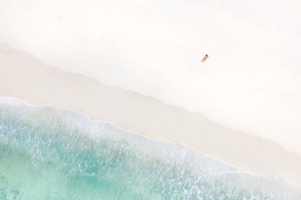 Photography by Gray Malin of Nude Sunbather, Black's Beach