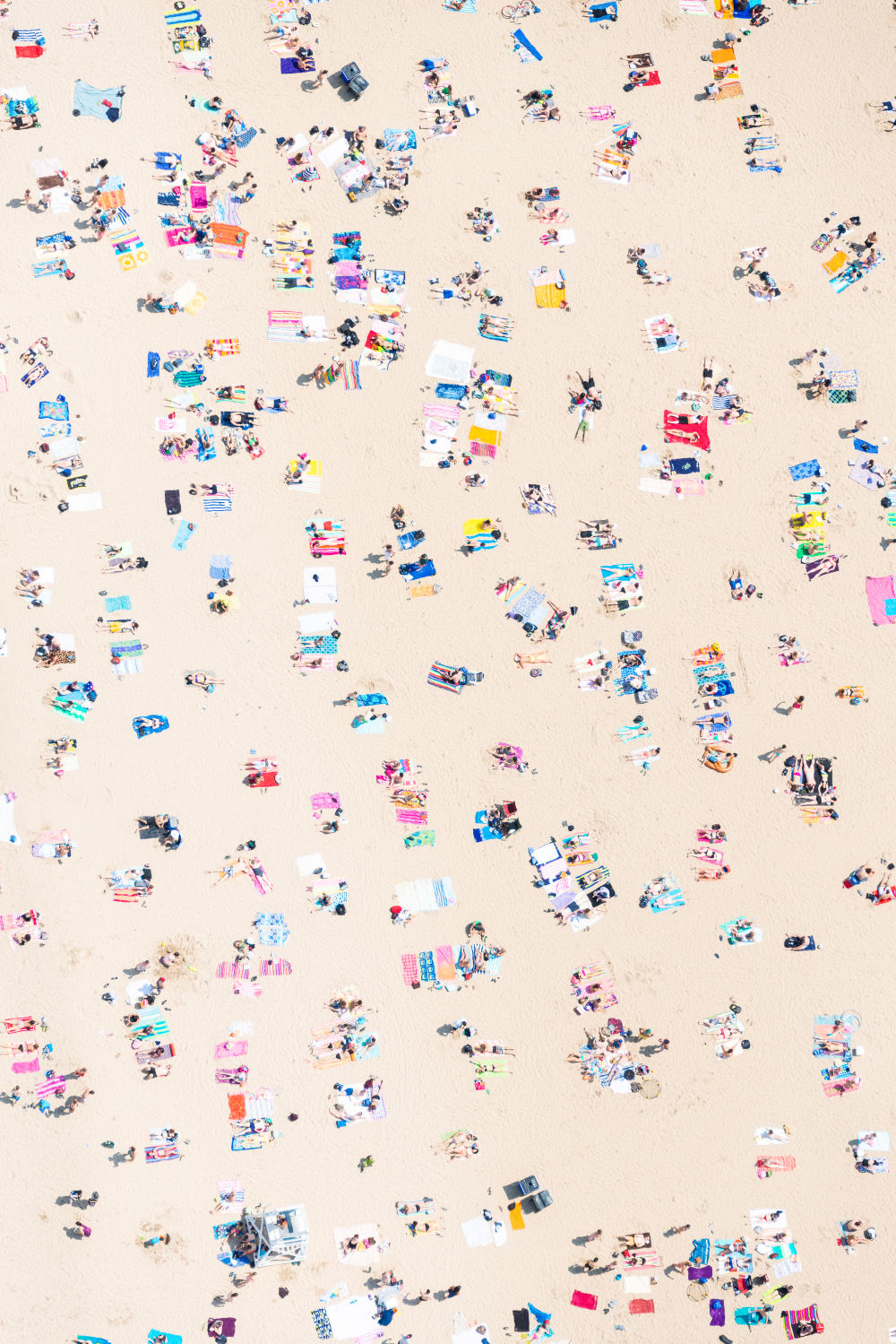Photography by Gray Malin of Oak Street Beach Sunbathers Vertical, Chicago