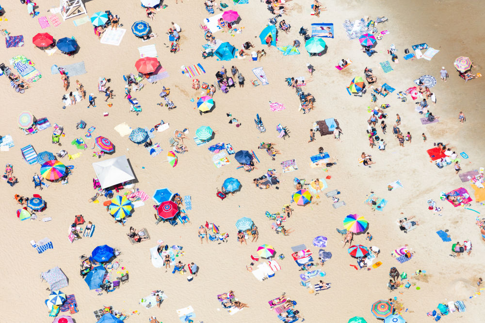 Photography by Gray Malin of Old Orchard Beach Sunbathers, Maine