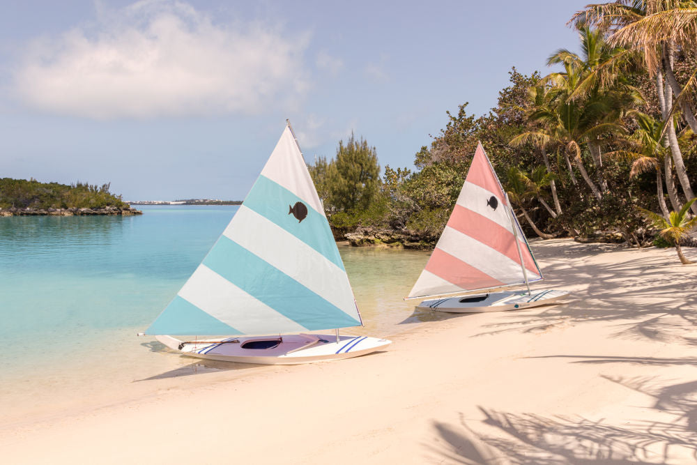 Photography by Gray Malin of Pastel Blue and Pink Sailboats, Tucker's Town