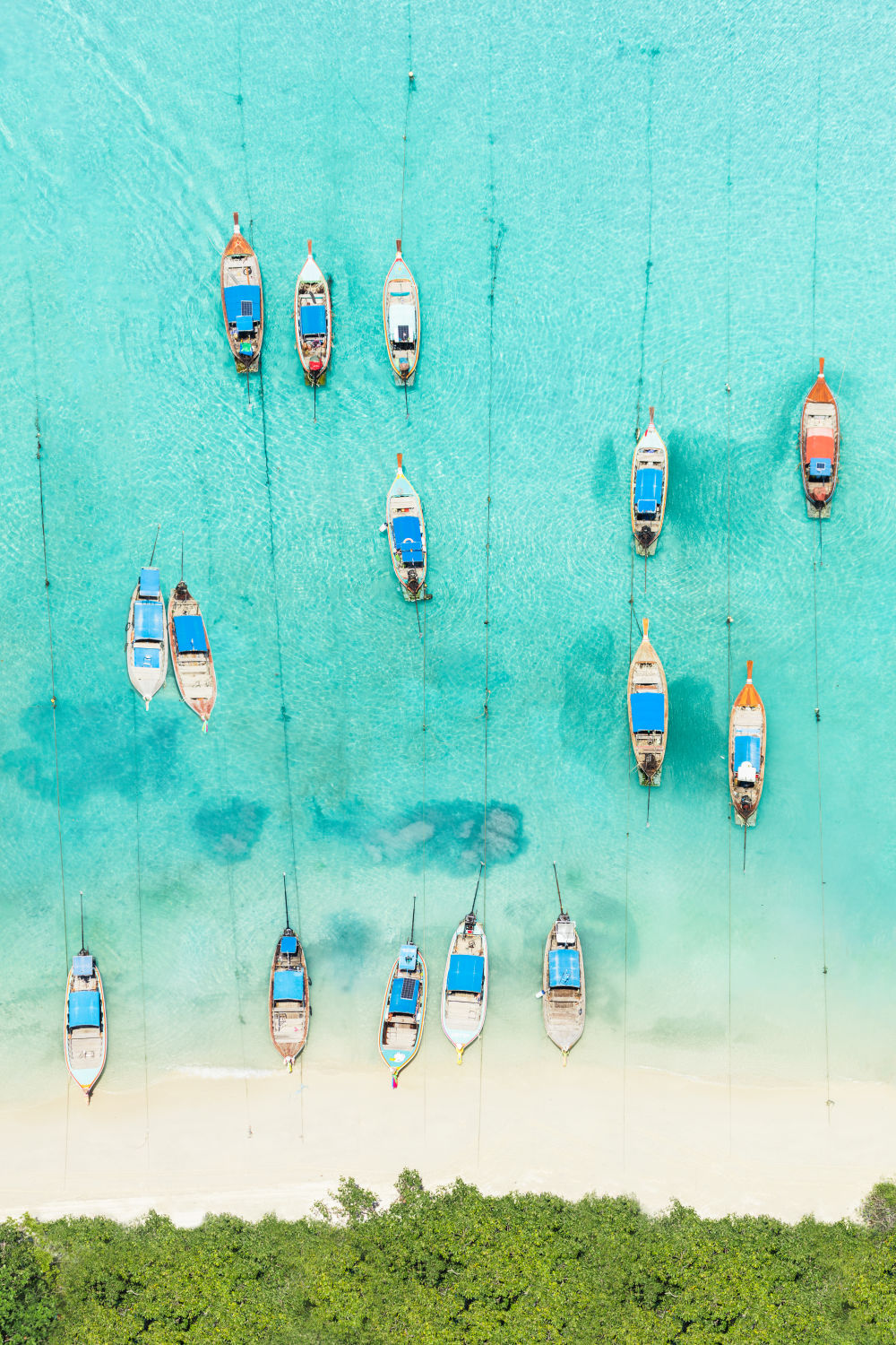 Photography by Gray Malin of Phi Phi Island Boats, Thailand