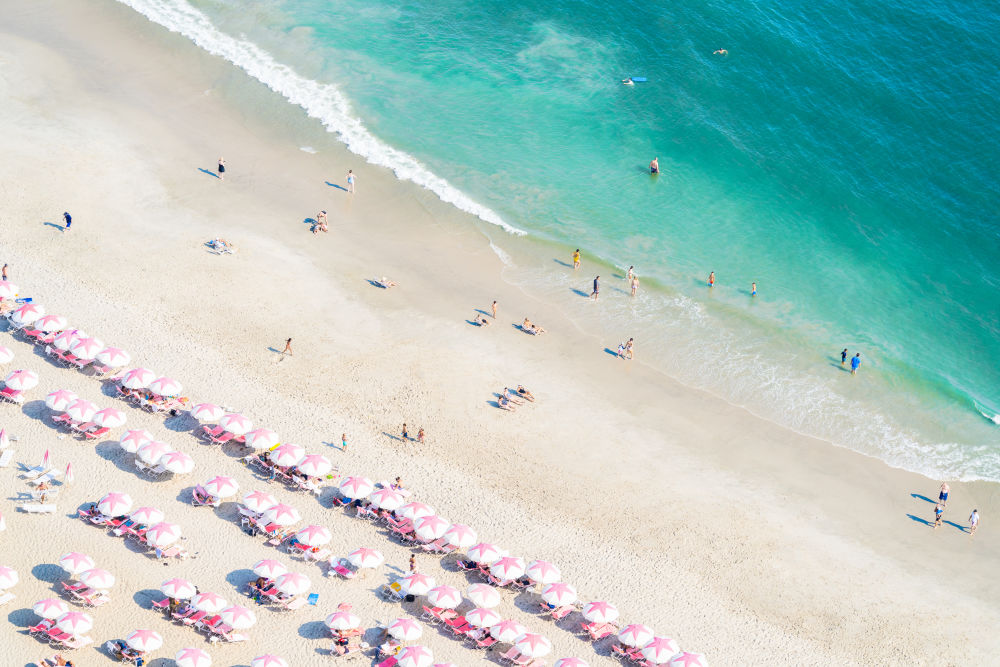 Photography by Gray Malin of Pink and White Umbrellas Diagonal, Cape May, New Jersey
