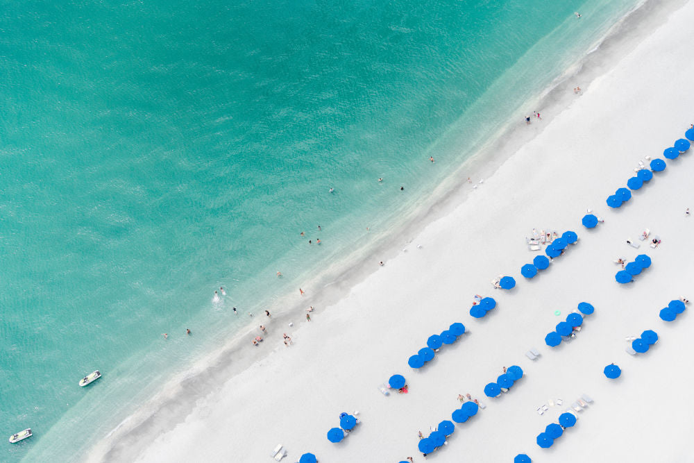 Photography by Gray Malin of Plantation Beach Club Sunbathers, Captiva Island, Florida