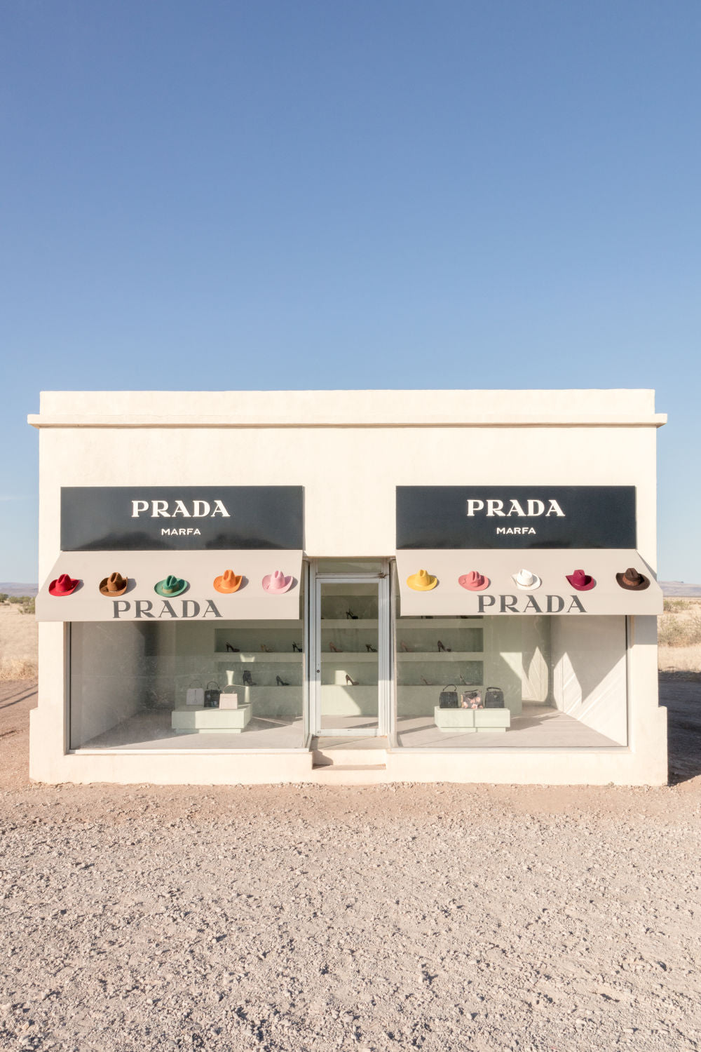 Photography by Gray Malin of Rainbow Cowboy Hats Vertical, Prada Marfa