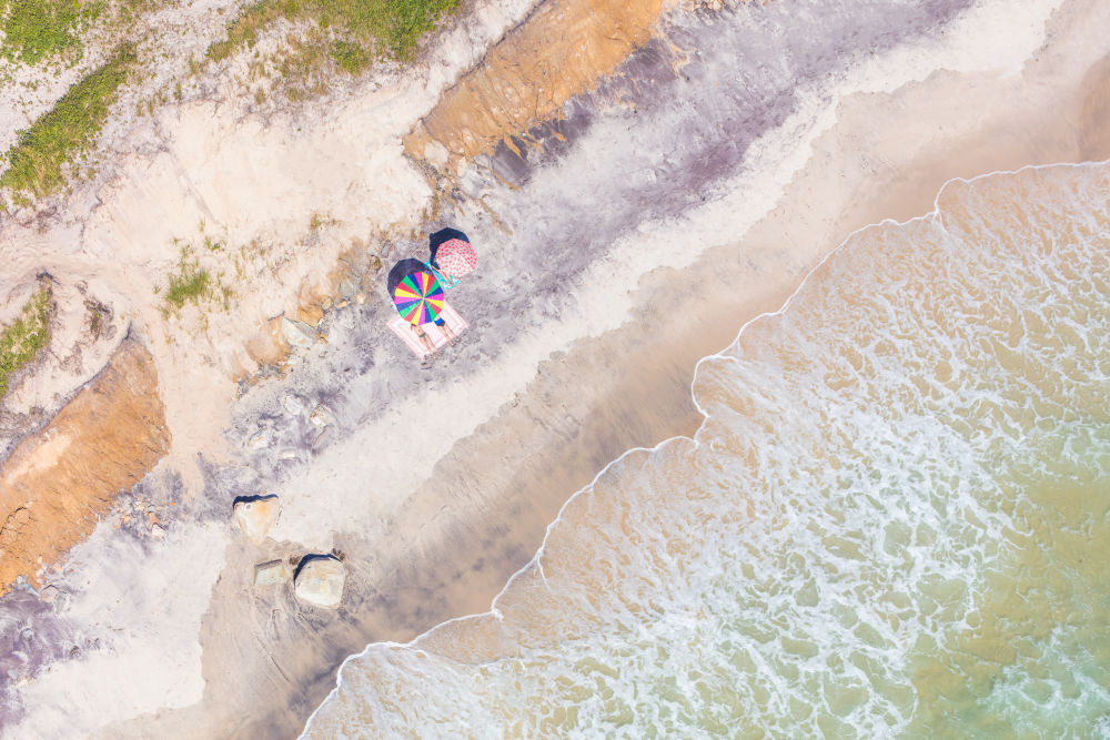 Photography by Gray Malin of Rainbow Umbrella, Gay Head Beach
