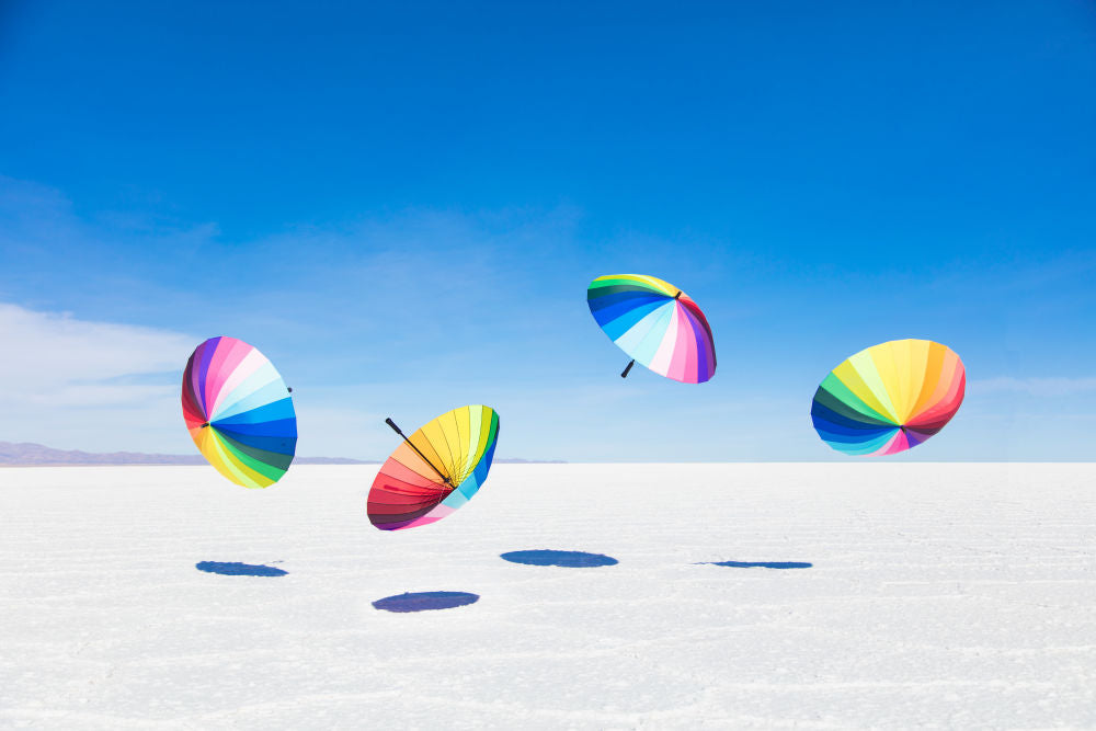 Photography by Gray Malin of Rainbow Umbrellas II