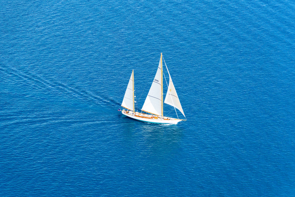 Photography by Gray Malin of Little Traverse Bay Sailboat, Harbor Springs, Michigan
