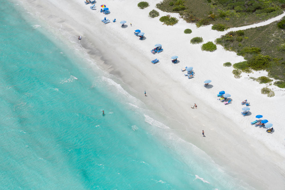 Photography by Gray Malin of Sanibel Beach Umbrellas, Sanibel Island, Florida