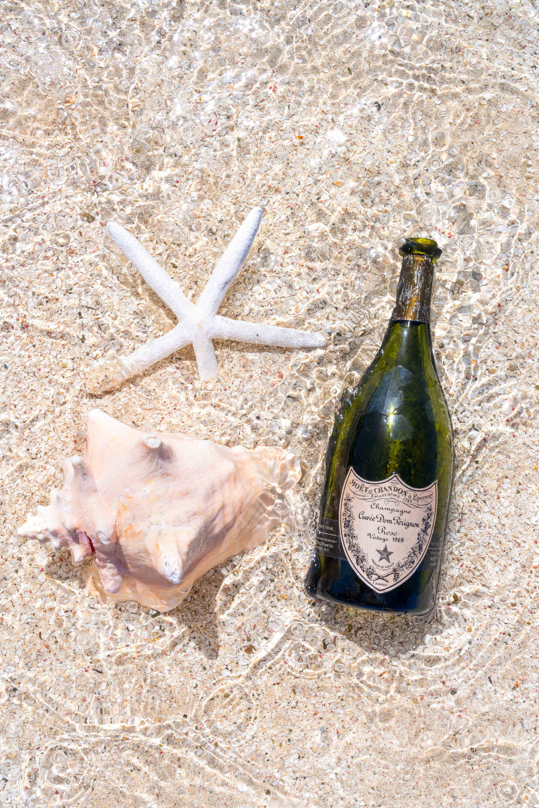 Photography by Gray Malin of Splash of 1969 Dom Perignon, St. Barths
