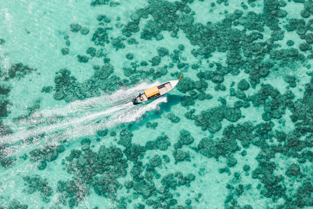 Photography by Gray Malin of The Boat Ride, Phang Nga Bay
