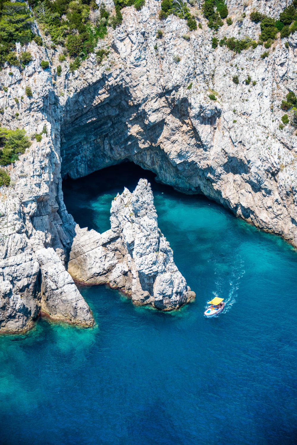 Photography by Gray Malin of The Green Grotto, Capri