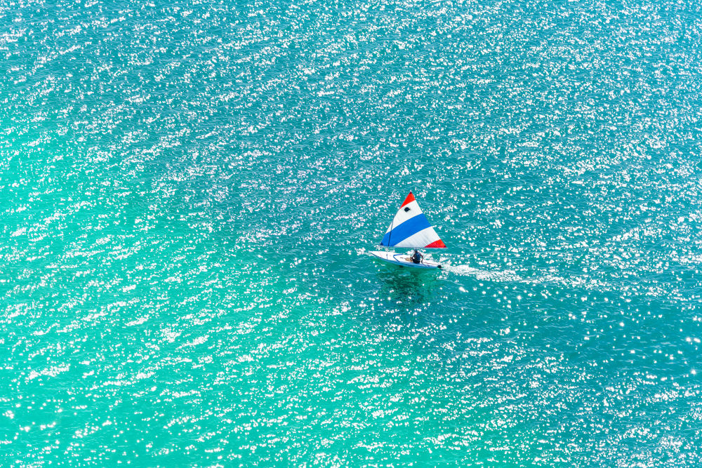 Photography by Gray Malin of The Sunfish Sailboat, Lake Michigan