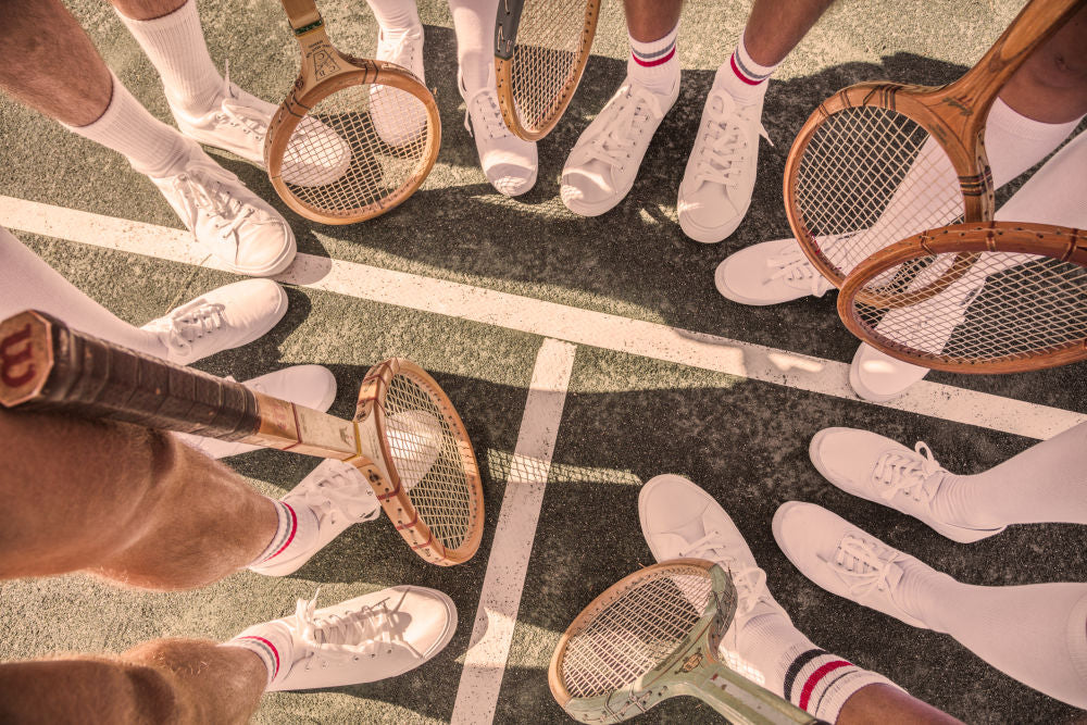 Photography by Gray Malin of The Tennis Team, Coral Beach Club