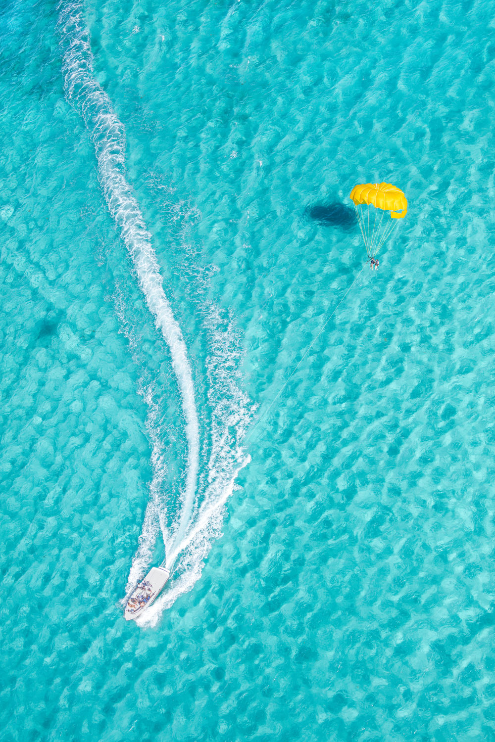 Photography by Gray Malin of The Yellow Parasail, Bahamas