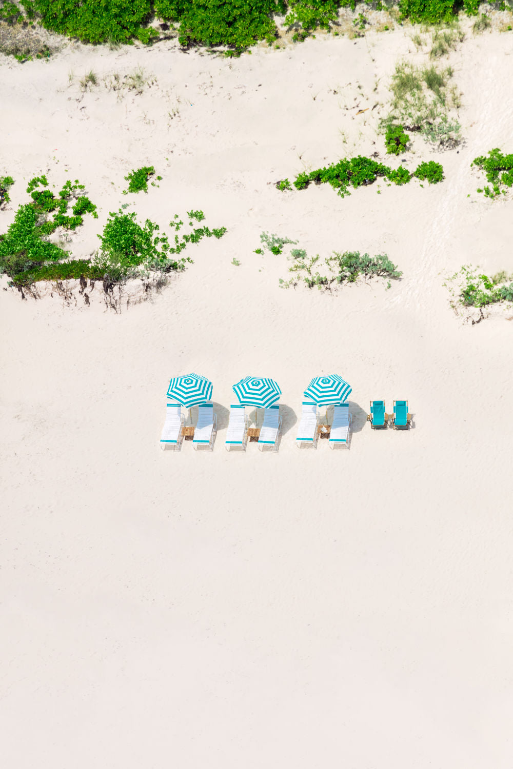 Photography by Gray Malin of Three Umbrellas, Harbour Island