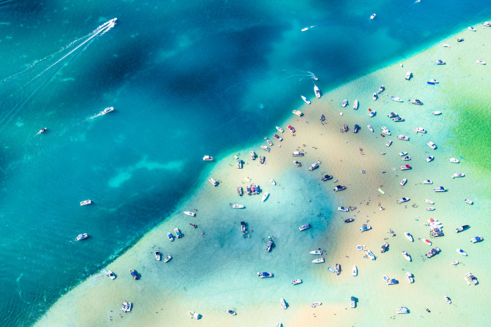 Photography by Gray Malin of Torch Lake Sandbar, Michigan