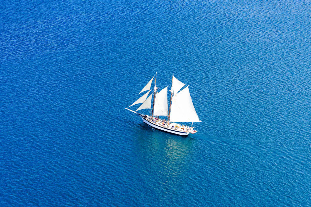 Photography by Gray Malin of Traverse Bay Sailboat, Michigan