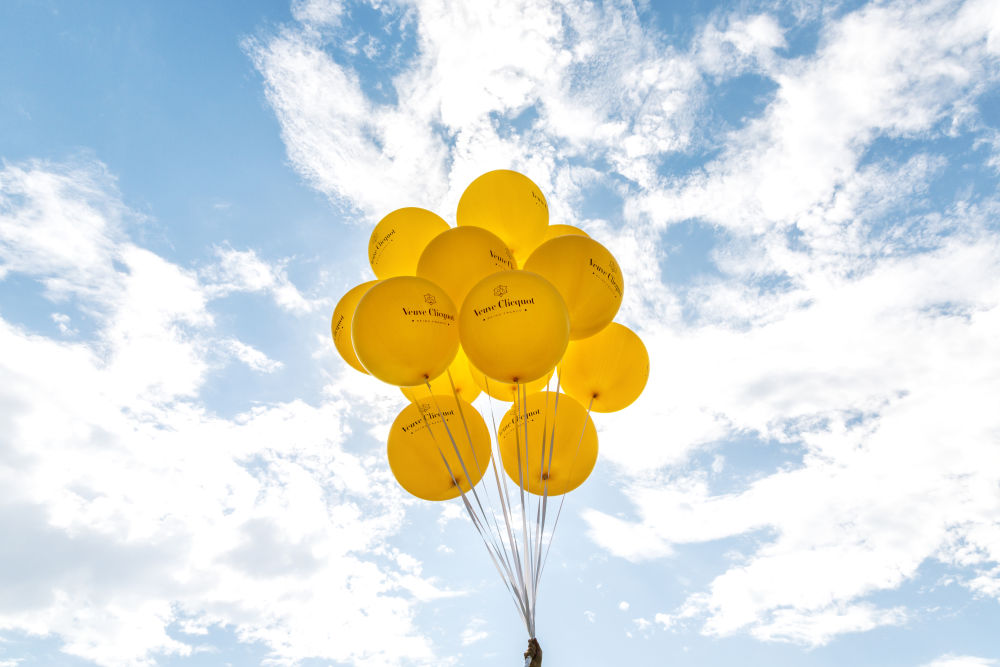 Photography by Gray Malin of Veuve Clicquot Yellow Balloons