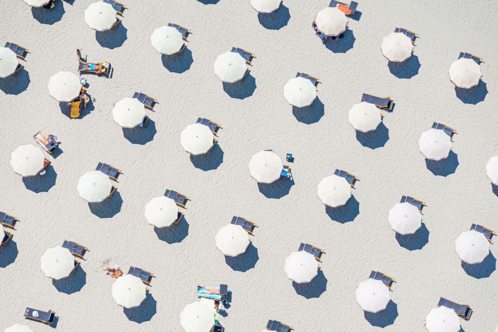 Photography by Gray Malin of White Beach Umbrellas, Italy