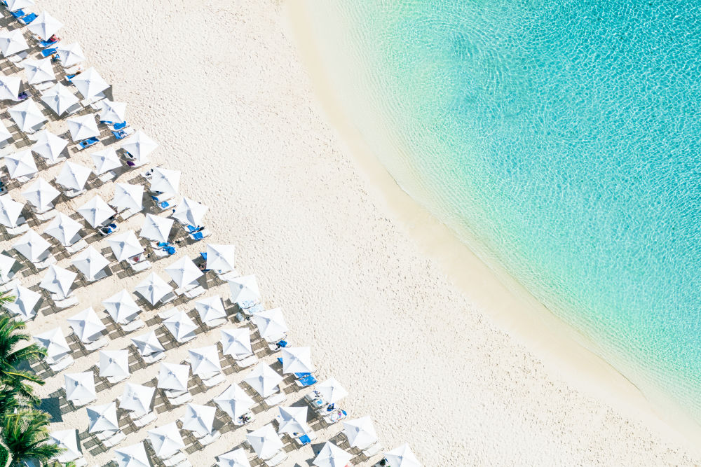 Photography by Gray Malin of White Umbrellas, Bahamas