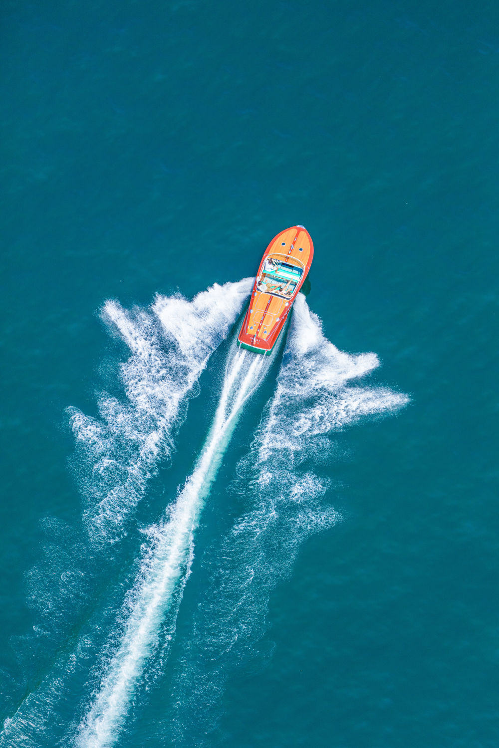 Photography by Gray Malin of Wooden Boat, Lake Como Vertical