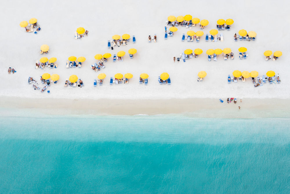 Photography by Gray Malin of Yellow Umbrellas, Bonita Springs, Florida